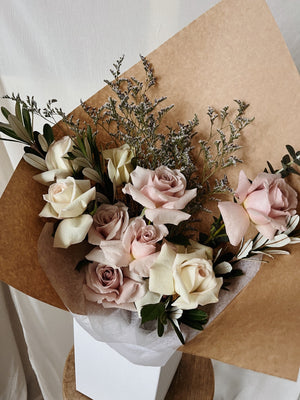Assorted variety pastel rose dozen bouquet